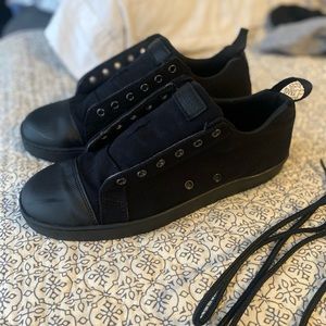 Woobies shoes, size 8.5 (men’s) in black.